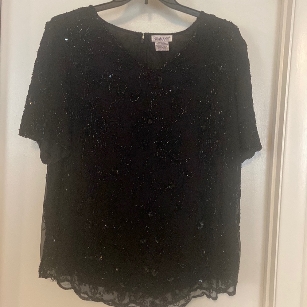 Black v-neck beaded  dressy top.100% polyester lined